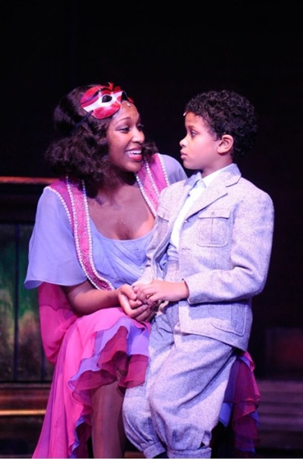 Della (left, Olivia-Diane Joseph) offers Twist (right, Alaman Diadhiou)  Photo